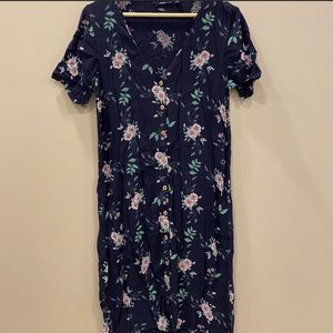 Below the knee button down dress.